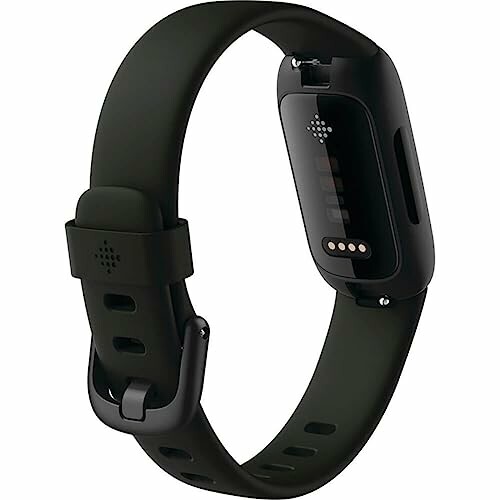 Black fitness tracker with a side view of the band and sensor.