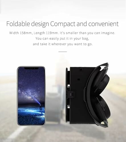 Foldable headphones next to a smartphone displaying a starry night sky.