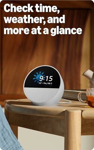 Smart display showing time and weather on a wooden table.