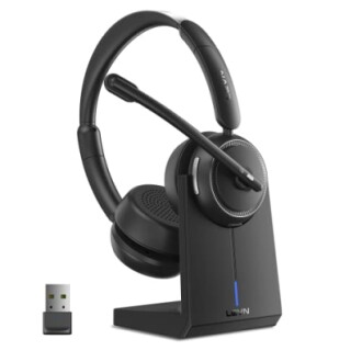 Wireless headset with USB dongle and charging stand.